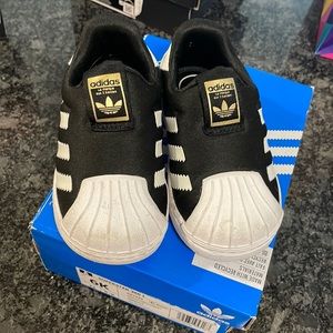 Worn couple of times baby super start adidas .